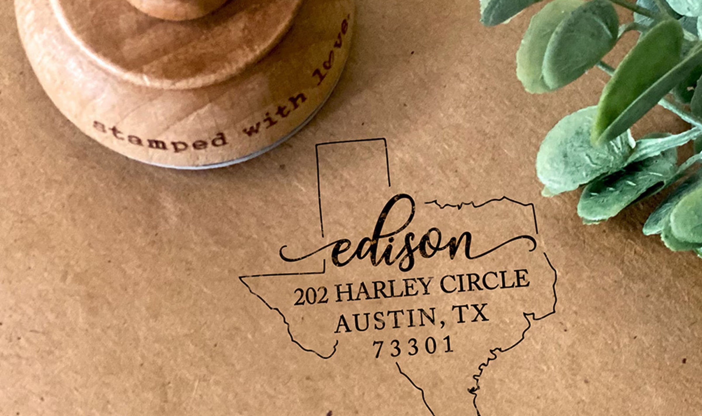 texas state stamp on kraft paper with plant and circular wooden stamp