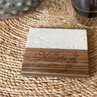 custom square coaster made with stone and wood materials engraved with text millers est 2011