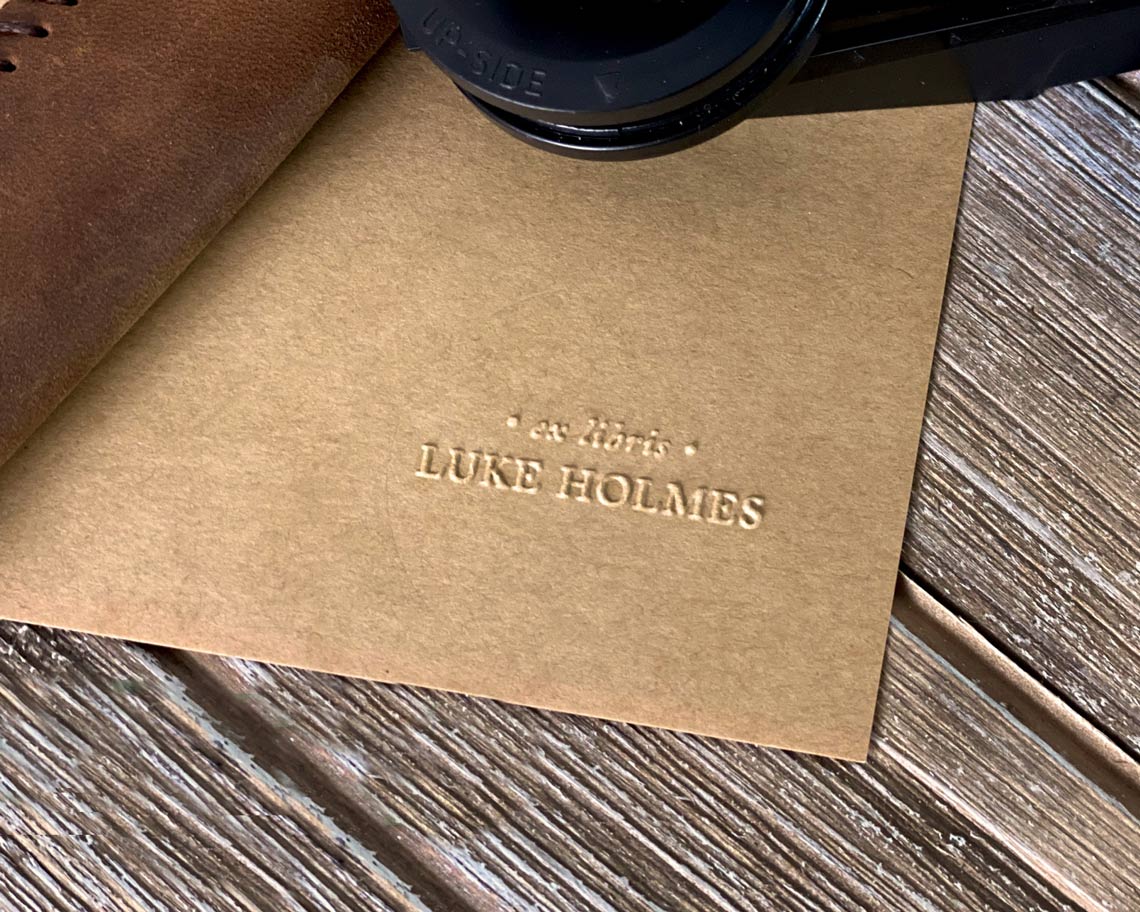 ex libris and name embossed using stamped with love custom book embosser