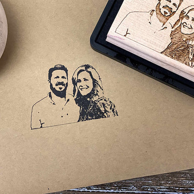 Custom face stamp with a portrait of a couple made into a rubber stamp