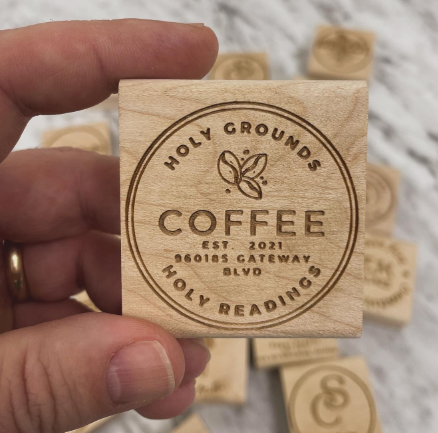 Coffee shop rubber stamp with branded cup design