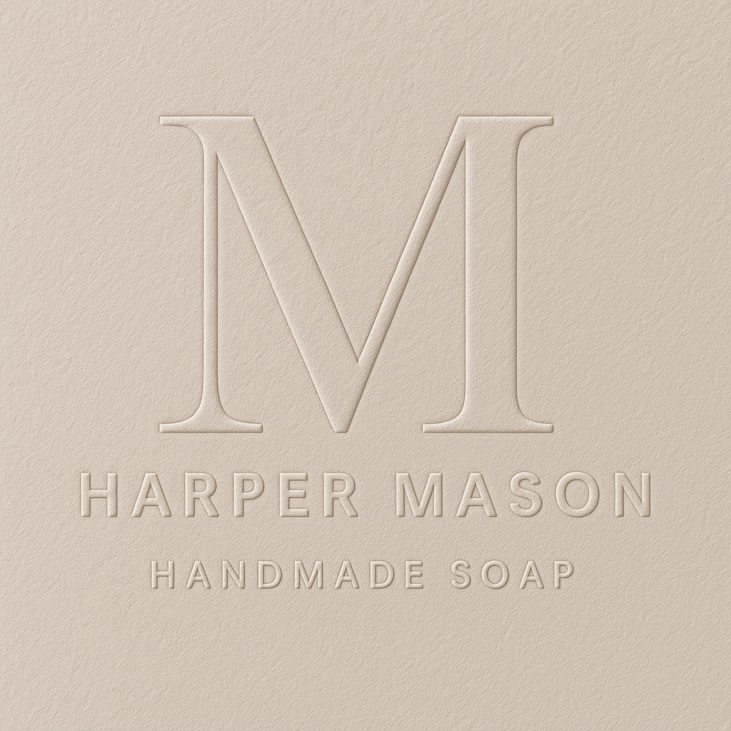 Embossed logo for wedding photographer Elizabeth Monroe in elegant circular design