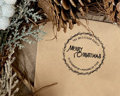Round Merry Christmas return address stamp with branch border and personalized name