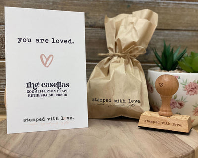 custom rectangular wooden rubber stamp with its imprint on a card