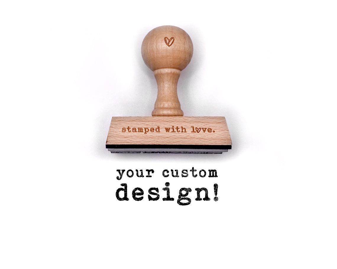 custom wood handle rubber stamp with stamped with love's logo engraved on the base and heart symbol on the knob handle