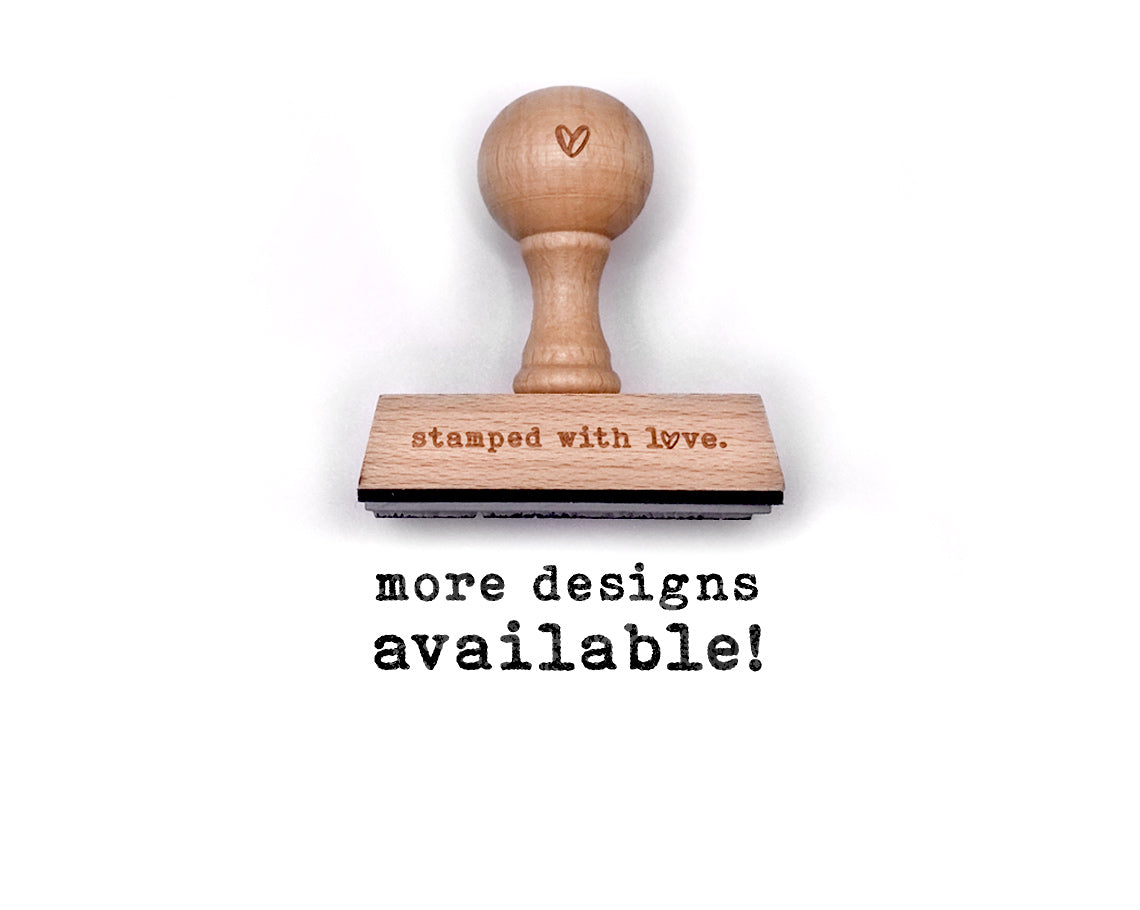 custom wood handle rubber stamp with stamped with love's logo engraved on the base and heart symbol on the knob handle