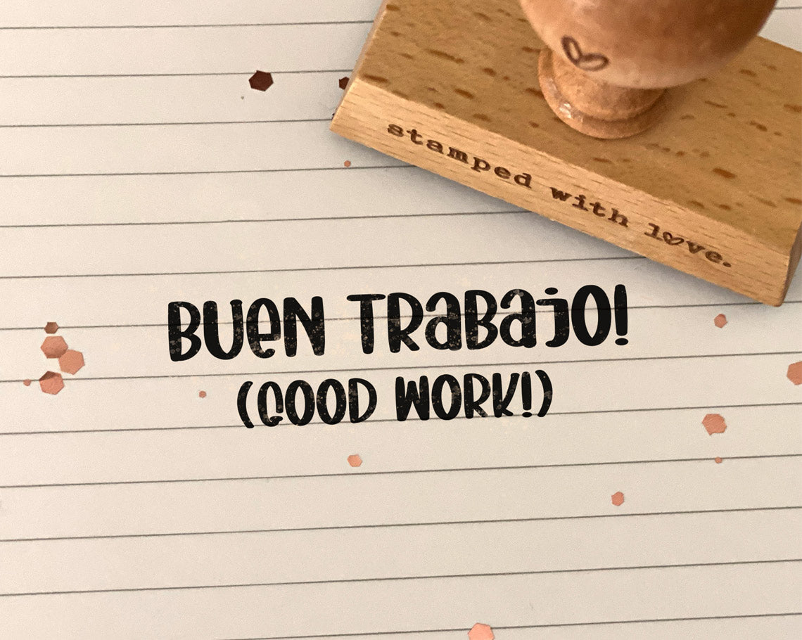 teacher rubber stamp imprint that says buen trabajo in spanish and good work in english